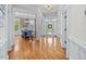 Spacious foyer with hardwood floors, ornate columns, and a dining area with natural light at 642 Bear Tree Creek, Chapel Hill, NC 27517