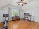 Bright office space with hardwood floors, desk and exercise equipment at 642 Bear Tree Creek, Chapel Hill, NC 27517