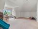 Spacious playroom featuring carpet, large window, and plenty of room for play and creativity at 642 Bear Tree Creek, Chapel Hill, NC 27517