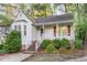 Charming single-story home with a welcoming front porch and well-maintained landscaping at 707 Cross Timbers Dr, Durham, NC 27713