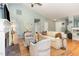 Bright living room featuring a fireplace, hardwood floors, and neutral decor at 707 Cross Timbers Dr, Durham, NC 27713