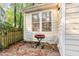 Private outdoor space with grill and chairs, perfect for enjoying warm weather dining at 707 Cross Timbers Dr, Durham, NC 27713
