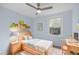 Well lit, carpeted bedroom with desk and natural light at 7715 Bernadette Ln, Raleigh, NC 27615