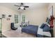Comfortable bedroom with plush carpet, neutral walls and two windows bringing in lots of light at 8 Queensland Ct, Durham, NC 27712