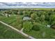 Lovely aerial view showcases a sprawling property with lush landscaping and mature trees at 9026 Privette Hill Ln, Spring Hope, NC 27882