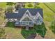 Stunning home with a covered patio, carport, and a meticulously manicured lawn at 9026 Privette Hill Ln, Spring Hope, NC 27882