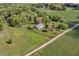 Stunning aerial view of a country home featuring a well-maintained property at 9026 Privette Hill Ln, Spring Hope, NC 27882