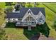 Stunning home with a covered patio, carport, and a meticulously manicured lawn at 9026 Privette Hill Ln, Spring Hope, NC 27882