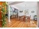 Dining area with hardwood floors open to the living room and kitchen, perfect for entertaining at 9026 Privette Hill Ln, Spring Hope, NC 27882