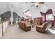 Huge living area with multiple seating areas, columns, and great natural light at 9026 Privette Hill Ln, Spring Hope, NC 27882