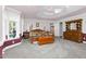 Spacious main bedroom features a decorative ceiling, ample storage, and large windows at 9026 Privette Hill Ln, Spring Hope, NC 27882
