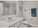 Neutral bathroom with a white sink and tiled floors at 95 Little Leaf Lane Ln, Clayton, NC 27527