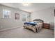 Bedroom featuring two windows, soft carpet, and neutral-colored walls at 95 Little Leaf Lane Ln, Clayton, NC 27527