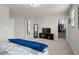 Spacious bedroom features neutral walls, carpet, and a tv entertainment center at 95 Little Leaf Lane Ln, Clayton, NC 27527