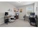 Bright office space featuring carpet and multiple workstations at 95 Little Leaf Lane Ln, Clayton, NC 27527