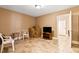 Unfinished basement area, ready for customization with an exit door at 955 Sagamore Dr, Louisburg, NC 27549