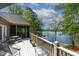 Relax on this lovely deck with lake views and plenty of seating at 955 Sagamore Dr, Louisburg, NC 27549
