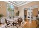 Inviting dining area with large windows and an open layout, ideal for entertaining guests at 955 Sagamore Dr, Louisburg, NC 27549