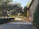 Long driveway leading to the house and showcasing partial lake views at 955 Sagamore Dr, Louisburg, NC 27549
