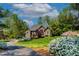 Charming brick home with lush landscaping and a well-kept lawn with beautiful lake views at 955 Sagamore Dr, Louisburg, NC 27549