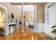 Spacious foyer featuring hardwood floors, white columns, and views of the dining room at 955 Sagamore Dr, Louisburg, NC 27549