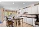 Bright kitchen with a center island, breakfast bar, and ample counter space at 955 Sagamore Dr, Louisburg, NC 27549