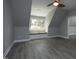 Bedroom with neutral paint, ceiling fan and a window seat overlooking the front yard at 10001 Sandcreek Ct, Chapel Hill, NC 27517
