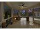 Cozy screened-in porch with stone fireplace and beautiful sunset views at 10001 Sandcreek Ct, Chapel Hill, NC 27517