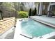 Relaxing hot tub on a wooden deck overlooking a beautiful wooded backyard at 10001 Sandcreek Ct, Chapel Hill, NC 27517