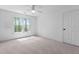 Bright bedroom with natural light streaming through a large window at 101 Preston Arbor Ln, Cary, NC 27513