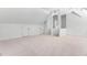 Spacious bonus room featuring stairs and dormer windows, perfect for a playroom at 101 Preston Arbor Ln, Cary, NC 27513