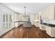 Gourmet kitchen with stainless steel appliances, custom cabinetry, and hardwood floors at 101 Preston Arbor Ln, Cary, NC 27513