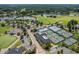 Aerial view of community tennis courts and surrounding amenities and parking at 101 Preston Arbor Ln, Cary, NC 27513