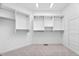 Spacious walk-in closet featuring built-in shelving and ample storage for organization at 101 Preston Arbor Ln, Cary, NC 27513