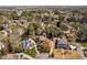 An aerial view of a neighborhood showcasing well-maintained homes and verdant landscaping at 102 Kamprath Pl, Cary, NC 27519