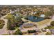 The aerial image shows a community space featuring a pond, clubhouse, and parking at 102 Kamprath Pl, Cary, NC 27519
