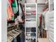 Organized closet featuring ample shelving, multiple rods, and neat storage solutions at 102 Kamprath Pl, Cary, NC 27519