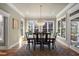 Bright dining room boasts natural light and stylish pendant lighting at 102 Kamprath Pl, Cary, NC 27519