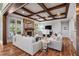 Comfortable living room with stone fireplace and views of the outdoor space at 102 Kamprath Pl, Cary, NC 27519