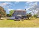 The backyard has a patio with a picnic table, perfect for outdoor dining and entertaining at 1020 Retriever Ln, Raleigh, NC 27603
