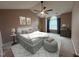 Well-lit bedroom with vaulted ceiling, ceiling fan, and comfortable bedding at 1020 Retriever Ln, Raleigh, NC 27603