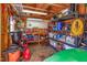 The interior of the shed boasts organized storage solutions, shelving, and a workbench at 1020 Retriever Ln, Raleigh, NC 27603
