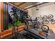 Open air gym featuring a treadmill and exercise bike, with a view to a serene backyard at 104 Vervain Way, Holly Springs, NC 27540
