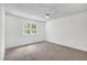 Clean bedroom with carpet, a ceiling fan and bright window offering natural light, lots of space at 105 Hobson Pl, Louisburg, NC 27549