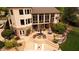 Expansive backyard with a patio, built in firepit and a view of a sparkling pool at 11 Swallow Tail Ct, Pittsboro, NC 27312