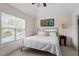 Cozy bedroom featuring a vaulted ceiling, plush carpet, a large window and a light color palette at 11 Swallow Tail Ct, Pittsboro, NC 27312
