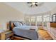 Light-filled bedroom with a tray ceiling, and natural light at 11 Swallow Tail Ct, Pittsboro, NC 27312
