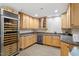 Well-equipped kitchenette with wine fridges, custom cabinetry, and granite countertops for entertaining at 11 Swallow Tail Ct, Pittsboro, NC 27312