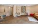 Spacious living room featuring modern decor, concrete floors, and ample natural light at 11 Swallow Tail Ct, Pittsboro, NC 27312