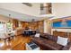 Open concept living and kitchen area with hardwood floors at 11 Swallow Tail Ct, Pittsboro, NC 27312